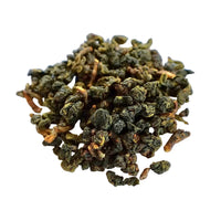fresh four season oolong from nantou, taiwan: a small pile of rolled green loose leaf