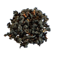 taitung red oolong from taiwan: a small pile of dark, tightly rolled loose leaf