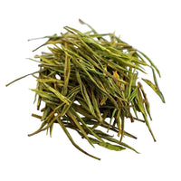 anji bai cha from zhejiang, china: a small pile of long, thin, pale green loose leaf